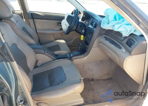 2000 Subaru Outback z USA, uszkodzony, nr VIN 4S3BH6754Y7654332